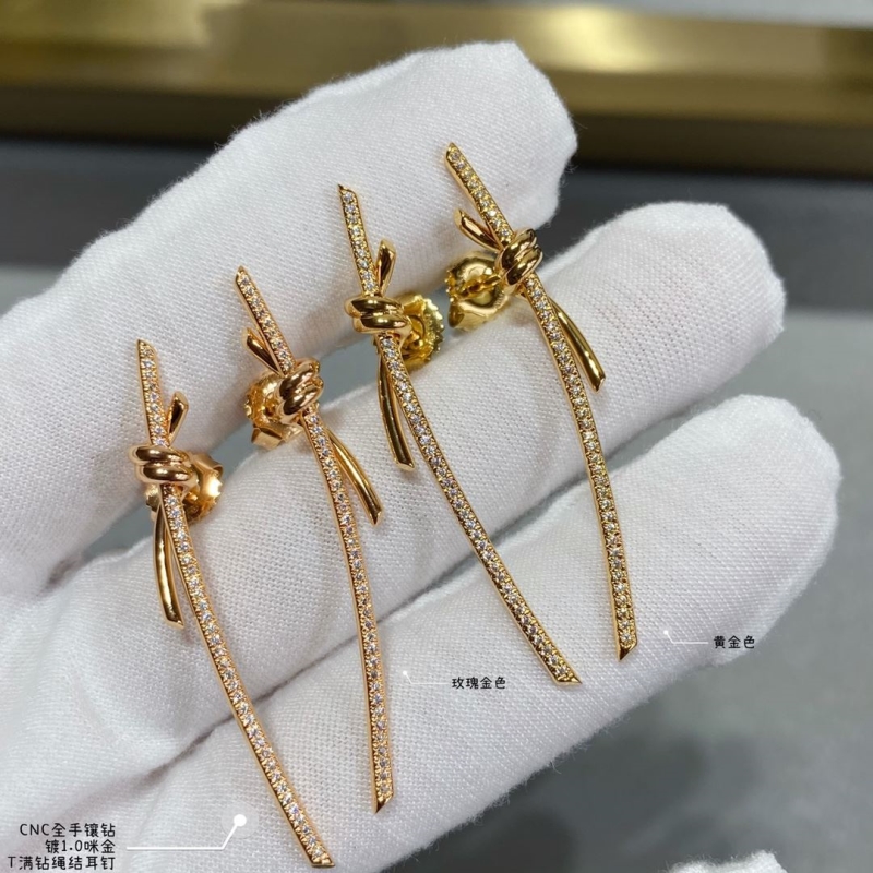T*f*ny earrings